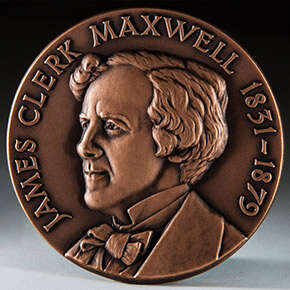 The inscription on the medal reads: James Clerk Maxwell 1831 to 1879