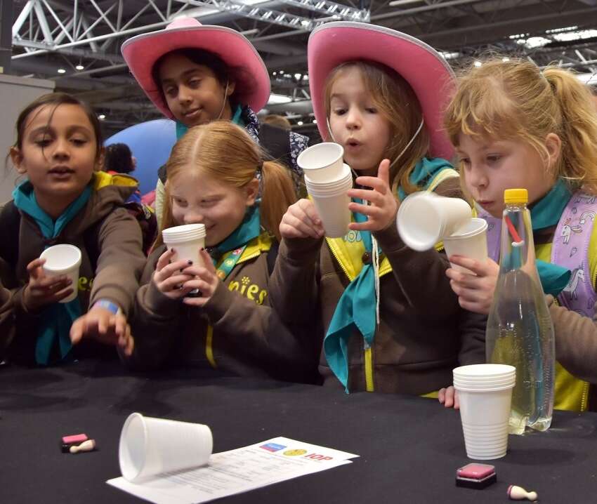 A group of Brownies try a physics experiment