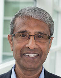 A headshot of Dr Mohammed Kamal Hossain smiling