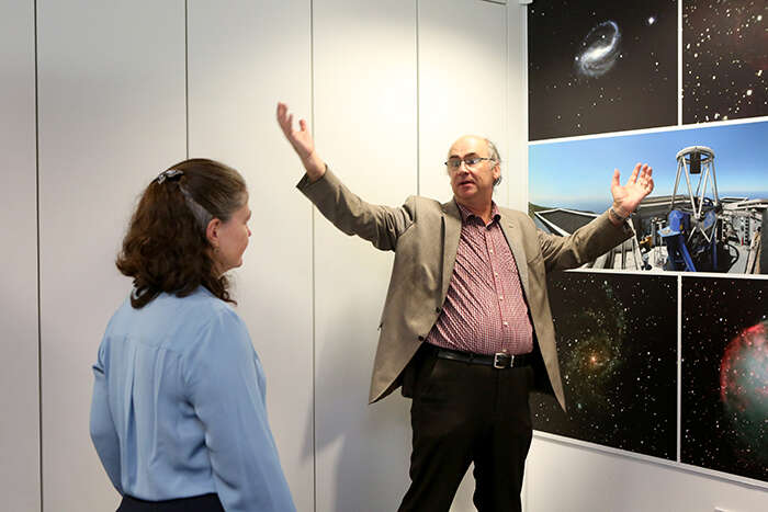 Dr Lisa Jardine-Wright with Professor Iain Steele demonstrating the Liverpool Telescope