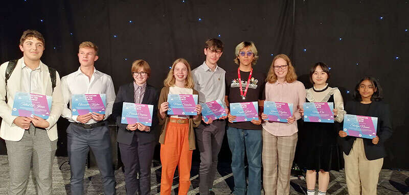 Students receiving their awards at the Photon 2022 conference