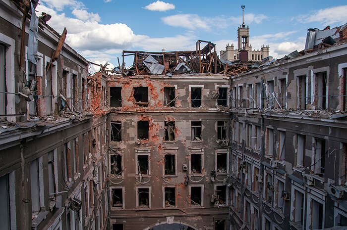 Buildings in Kharkiv, Ukraine damaged, with the windows blown out